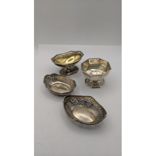 178 - Silver items to include two octagonal shaped salt pots both on pedestal bases, together with two ova... 