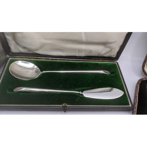 186 - Silver to incude a pair of salts one four feet, a christening set, along with a set of six silver te... 