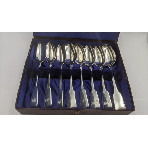 187 - Eight silver fiddle pattern tea spoons, five hallmarked London 1865, along with other dates in a fit... 