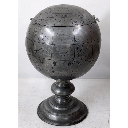 201 - A Chinese pewter tea caddy cast in the form of a globe, the base stamped Nguan Kwang Heng Swattow A/... 