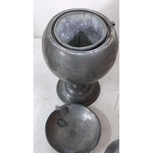 201 - A Chinese pewter tea caddy cast in the form of a globe, the base stamped Nguan Kwang Heng Swattow A/... 