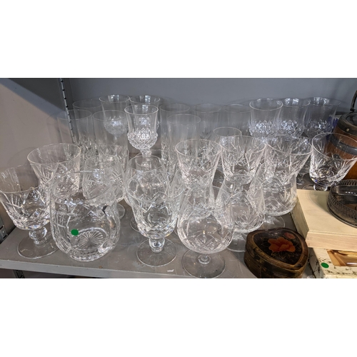 204 - A mixed lot to include glassware, biscuit barrel, Mdina bottle, silver plate including an entrée dis... 