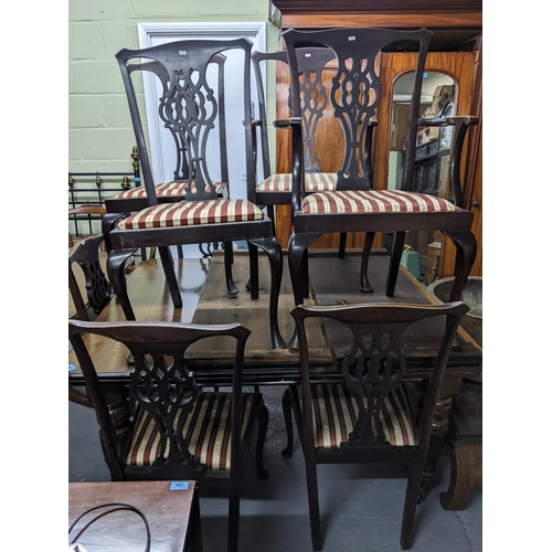 234 - An Edwardian mahogany wind-out extending dining table  with two extra leaves (with winding key) 73cm... 