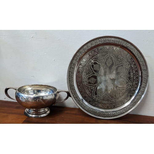 452 - An early 20th century silver twin handled sugar bowl, 154.6 grams, together with an engraved silver ... 