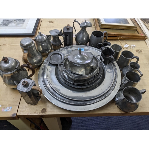 457 - A selection of 18th, 19th and 20th pewter wares to include chargers, plates a manor pewter tea caddy... 