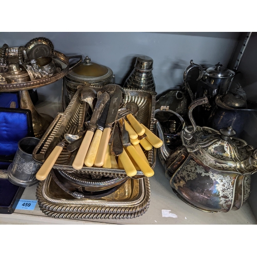 459 - A quantity of Victorian and later silver plate to include a cocktail shaker, wine bottle holder, var... 