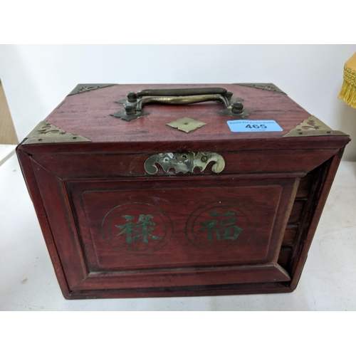 465 - A 20th century wooden cased Mah Jong set with bone and bamboo tiles, bone sticks and dice, the case ... 