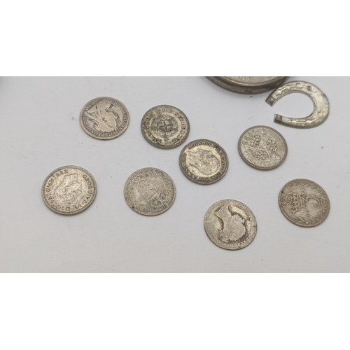 141 - Silver to include a charm bracelet with a quantity of silver and white metal charms, a Victorian whi... 