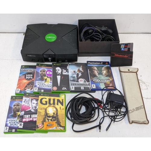 339 - An Xbox One, with a controller, converter and a selection of games to include Need for Speed Undergr... 