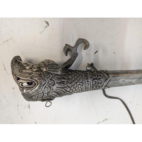 344 - A silver plated Nepalese trumpet Location: LAM
If there is no condition report shown, please request