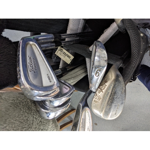 366 - Golf clubs to include Titleist irons, Tom Watson and Cleveland wedges and Yonex carbon fibre woods, ... 