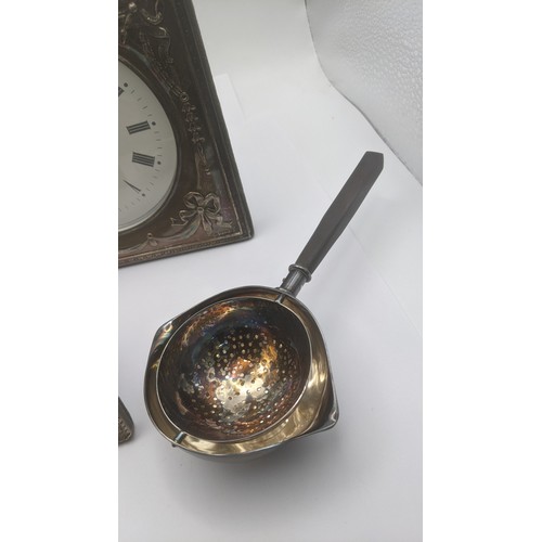 171 - Mixed silver items to include a tea caddy pot 91.9g, silver fronted desk clock, photo frame and a si... 