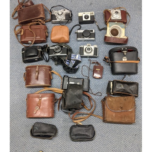 378 - A mixed lot of binoculars and photographic equipment and accessories to include an Instaload 126, tw... 