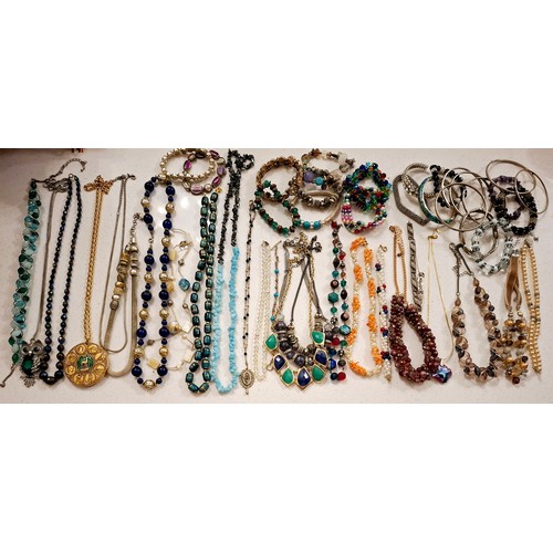 52 - A quantity of vintage costume jewellery and collectables, mainly bead necklaces, brooches A/F and br... 