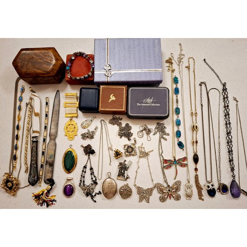 52 - A quantity of vintage costume jewellery and collectables, mainly bead necklaces, brooches A/F and br... 