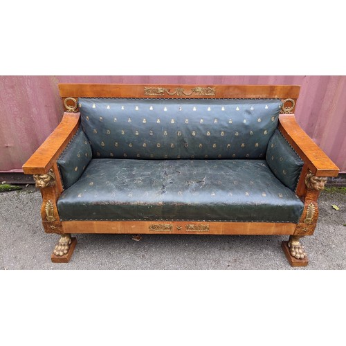 243 - An early 19th century Empire burr walnut and satinwood two seater sofa, applied gilt metal mounts in... 