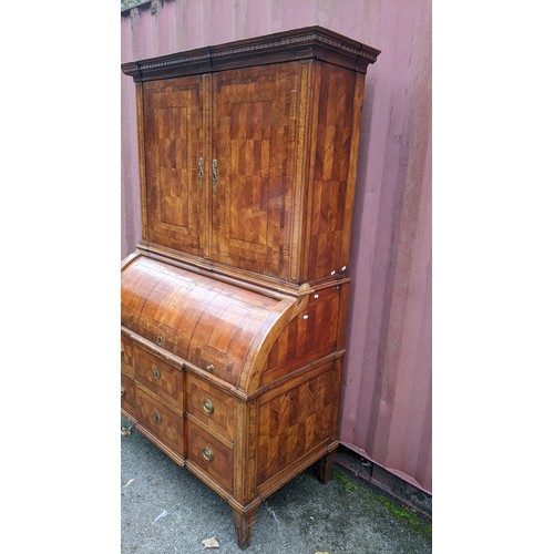 244 - A late 18th century German secretaire cylinder desk, inlaid with mixed veneers, chequer banded, dent... 