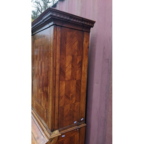 244 - A late 18th century German secretaire cylinder desk, inlaid with mixed veneers, chequer banded, dent... 