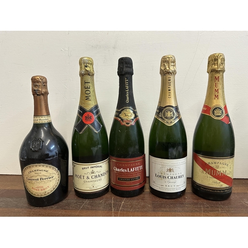 122 - Five bottles of Champagne to include G H Mumm & Moet Chandon and three bottles of Cava 
Location:
If... 