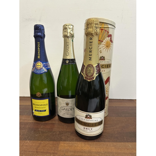 123 - Three bottles of Champagne to include Mercier 750ml, Gardet, Heidsieck Blue Top
Location:
If there i... 