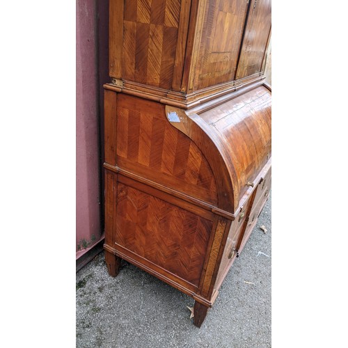 244 - A late 18th century German secretaire cylinder desk, inlaid with mixed veneers, chequer banded, dent... 