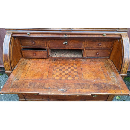 244 - A late 18th century German secretaire cylinder desk, inlaid with mixed veneers, chequer banded, dent... 