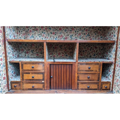 244 - A late 18th century German secretaire cylinder desk, inlaid with mixed veneers, chequer banded, dent... 