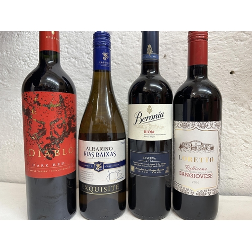 38 - Eight mixed red and white wines, a single bottle of Dows Port and presentation case with six Banfi w... 