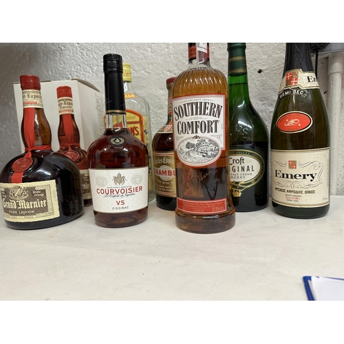 49 - Seven mixed bottles to include Southern Comfort, Croft Sherry, Cognac, Drambuie
Location:
If there i... 