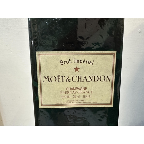 5 - A single bottle of Moet Chandon, sealed and wrapped
Location:
If there is no condition report shown,... 