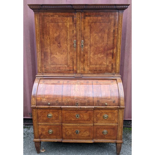 244 - A late 18th century German secretaire cylinder desk, inlaid with mixed veneers, chequer banded, dent... 