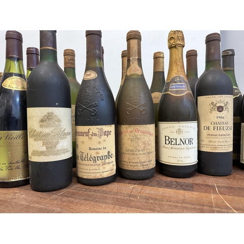 66 - A selection of fourteen mixed red wines to include Pinot Noir, Chateauneuf du Pape, Pauillac 1988 vi... 