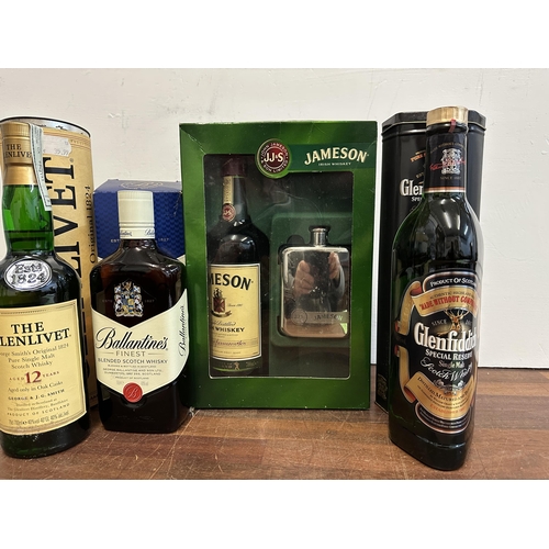 77 - Four bottles of Whisky to include Glenfiddich, 70cl, Jamesons 700ml, Ballentines 70cl, The Glenlivet... 