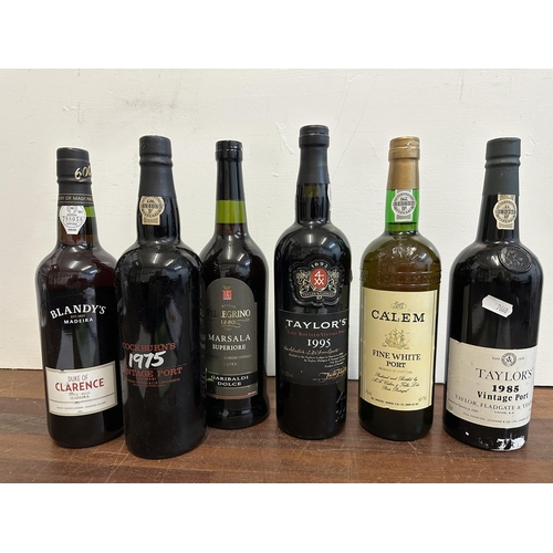 98 - Six bottles to include Taylors vintage Port 1985, fine white Port, Cockburn's 1975 vintage Port
Loca... 