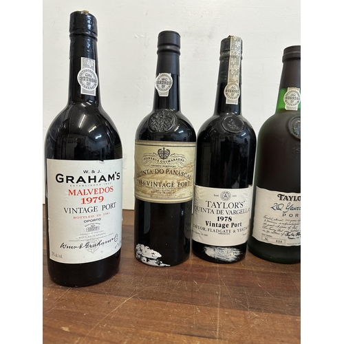 97 - Seven bottles of port to include Graham's 1979, Quinta Do Panascal 1986, Taylors 1978, Warres 1992, ... 