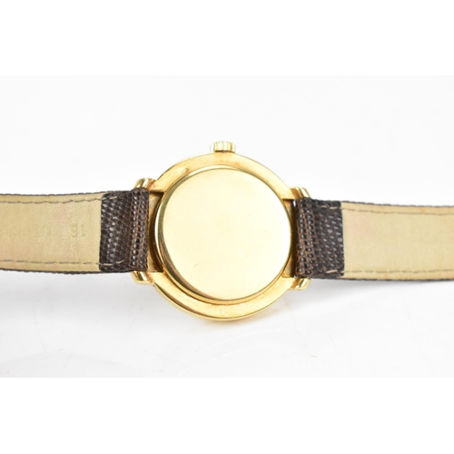 106 - A Patek Philippe, manual wind, gents, 18ct gold wristwatch, circa 1945-50, the silvered dial having ... 