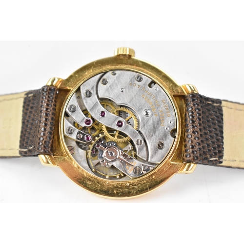 106 - A Patek Philippe, manual wind, gents, 18ct gold wristwatch, circa 1945-50, the silvered dial having ... 