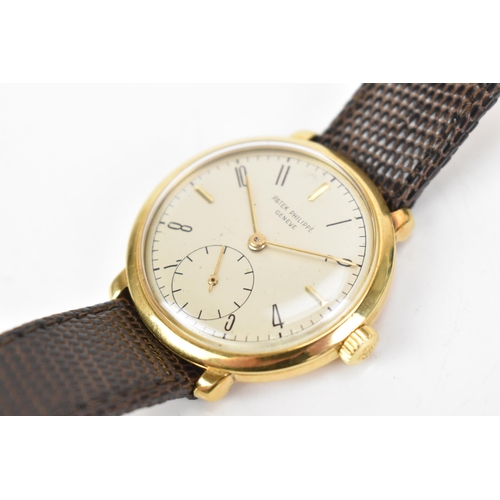 106 - A Patek Philippe, manual wind, gents, 18ct gold wristwatch, circa 1945-50, the silvered dial having ... 