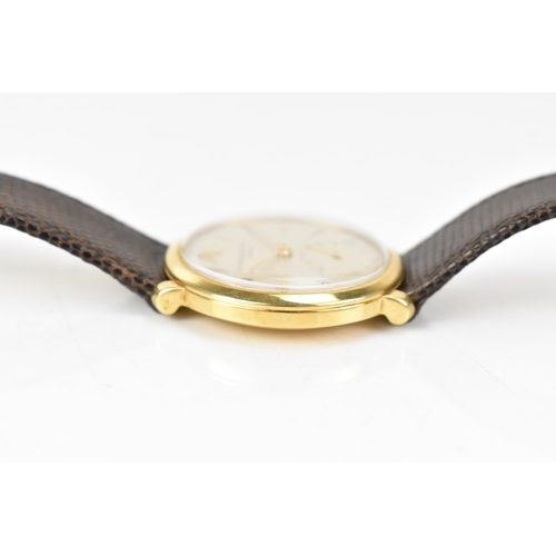 106 - A Patek Philippe, manual wind, gents, 18ct gold wristwatch, circa 1945-50, the silvered dial having ... 