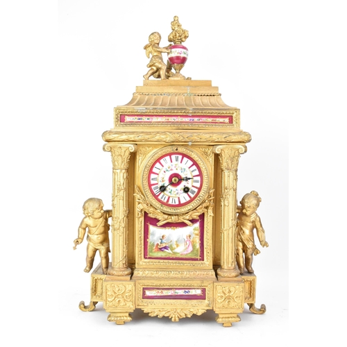 111 - A late 19th century French gilt metal mantle clock, the case of architectural form, mounted with che... 