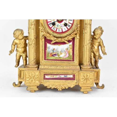 111 - A late 19th century French gilt metal mantle clock, the case of architectural form, mounted with che... 