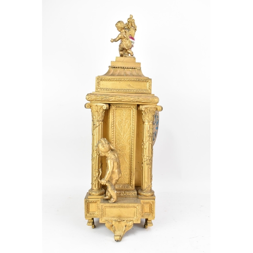 111 - A late 19th century French gilt metal mantle clock, the case of architectural form, mounted with che... 