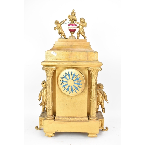 111 - A late 19th century French gilt metal mantle clock, the case of architectural form, mounted with che... 