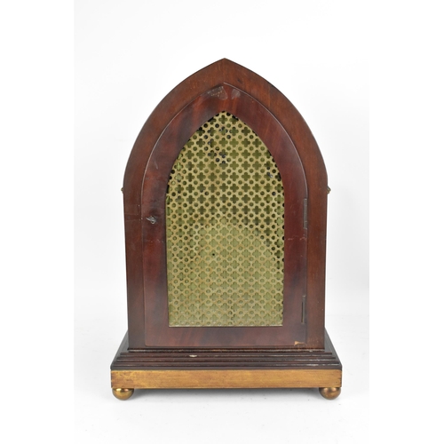 112 - An Edwardian mahogany mantle clock, Regency inspired with pierced gilt metal grilles, twin lion ring... 