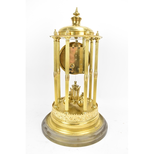 114 - A circa 1900 gilt metal anniversary clock with glass dome, the 3.5