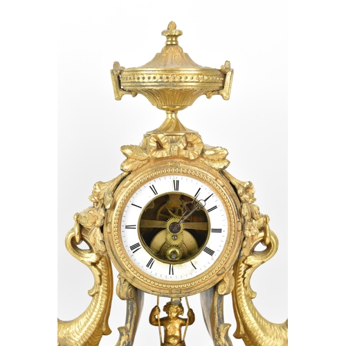 116 - A late 19th century French gilt metal mantle clock, the case decorated with an urn finial, flowers a... 