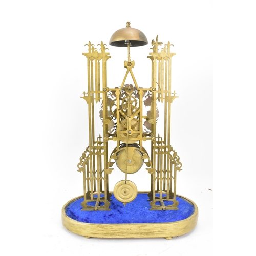 117 - A 19th century brass skeleton clock, having Roman numerals and white enamel plaques, 8 day chain fus... 