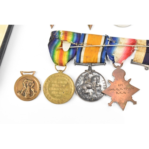 131 - A WWI and WWII medal group to include a cased military cross, 1914/15 star, War and Victory medal na... 