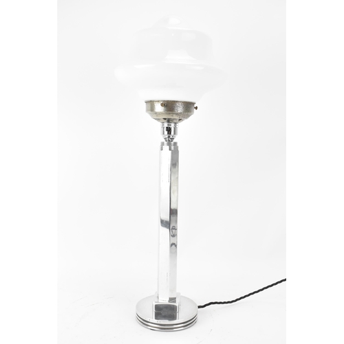 132 - An Art Deco scratch built table lamp, the base made from a piston, stamped RR, possibly for Rolls Ro... 