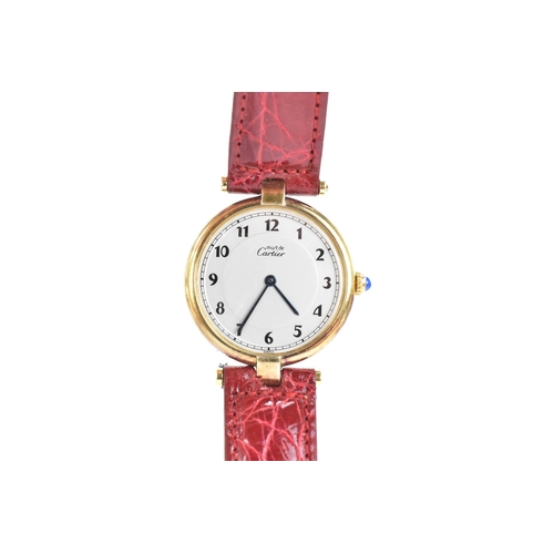 5 - A Cartier 'Must de' Vendome, quartz, ladies, silver gilt wristwatch, having a silvered dial with Ara... 